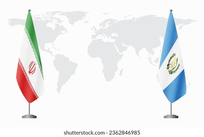 Iran and Guatemala flags for official meeting against background of world map.