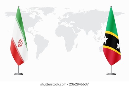 Iran and Saint Kitts and Nevis flags for official meeting against background of world map.