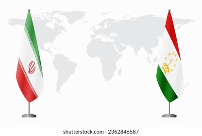 Iran and Tajikistan flags for official meeting against background of world map.