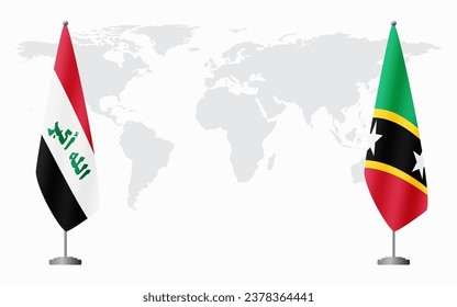 Iraq and Saint Kitts and Nevis flags for official meeting against background of world map.
