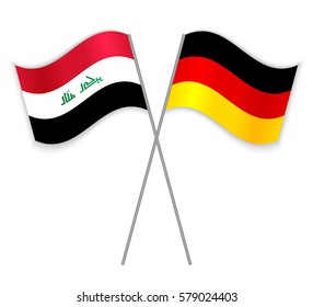 Iraqi and German crossed flags. Iraq combined with Germany isolated on white. Language learning, international business or travel concept.