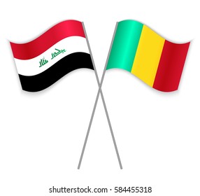 Iraqi and Guinean crossed flags. Iraq combined with Guinea isolated on white. Language learning, international business or travel concept.