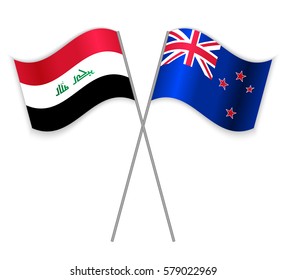 Iraqi and NZ crossed flags. Iraq combined with New Zealand isolated on white. Language learning, international business or travel concept.