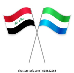 Iraqi and Sierra Leonean crossed flags. Iraq combined with Sierra Leone isolated on white. Language learning, international business or travel concept.