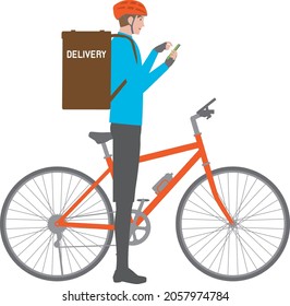 Iras of a delivery young man and a bicycle looking at a smartphone