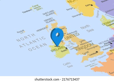 Ireland with blue placeholder pin on europe map, close up Ireland, colorful map with location icon, travel idea, vacation and road trip concept, pinned destination, top view