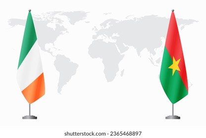 Ireland and Burkina Faso flags for official meeting against background of world map.