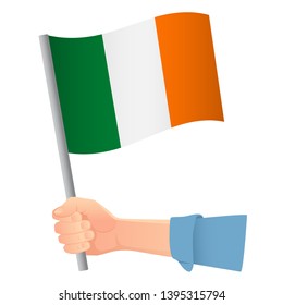Ireland flag in hand. Patriotic background. National flag of Ireland vector illustration