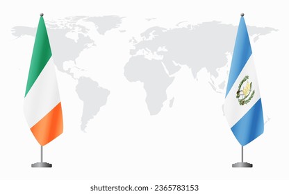 Ireland and Guatemala flags for official meeting against background of world map.