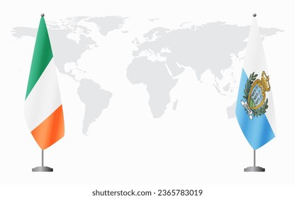 Ireland and San Marino flags for official meeting against background of world map.