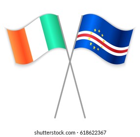 Irish and Cabo Verdean crossed flags. Ireland combined with Cabo Verde isolated on white. Language learning, international business or travel concept.