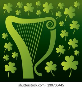 An irish celtic harp surrounded by shamrocks.