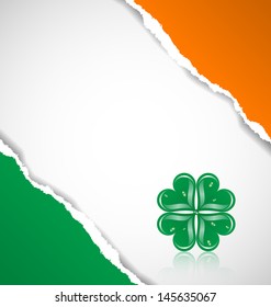 Irish flag background made of torn papers with clover