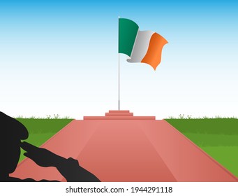 Irish flag on the pole with the image of a soldier saluting the flag