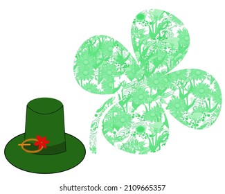 An Irish hat with a red flower and huge shamrock with a floral decoration inside.