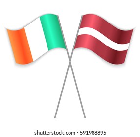 Irish and Latvian crossed flags. Ireland combined with Latvia isolated on white. Language learning, international business or travel concept.