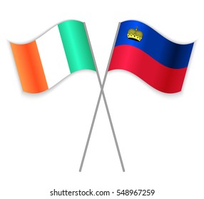 Irish and Liechtenstein crossed flags. Ireland combined with Liechtenstein isolated on white. Language learning, international business or travel concept.