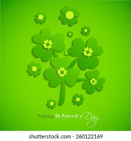 Irish lucky shamrock and clover leaves on shiny green background for Happy St. Patrick's Day celebration.