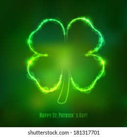 Irish shamrock for St Patrick's Day on dark green background