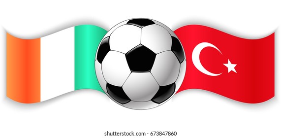 Irish and Turkish wavy flags with football ball. Ireland combined with Turkey isolated on white. Football match or international sport competition concept.