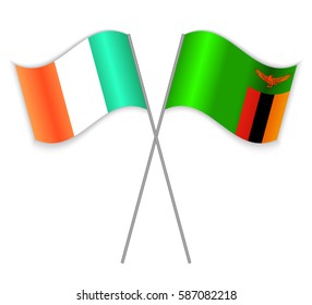 Irish and Zambian crossed flags. Ireland combined with Zambia isolated on white. Language learning, international business or travel concept.