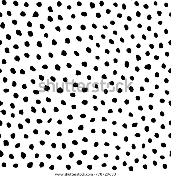 Irregular black dots pattern.\
Seamless hand drawn graphic print. Chaotic vector\
illustration