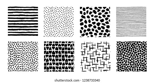 Irregular dots, striped, triangles brush strokes patterns. Seamless hand drawn painted elements. Vector graphic print. Art blotches background