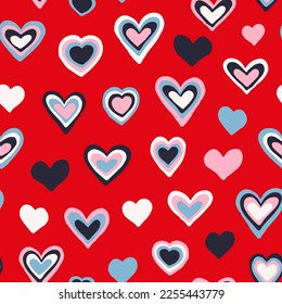 Irregular hand drawn hearts seamless repeat pattern. Romantic, vector all over surface print on red background.