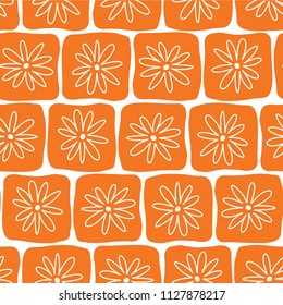 Irregular orange squares with white flowers on a white background. Seamless vector pattern. Perfect for backgrounds, fabric, packaging, and wallpaper projects.