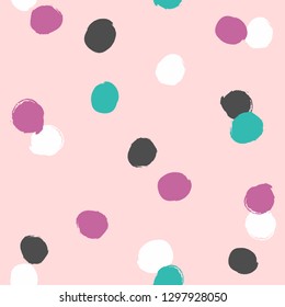 Irregular polka dot drawn by hand with rough brush. Simple seamless pattern. Grunge, sketch, watercolor. Pink, blue, black, purple, white. Vector illustration.