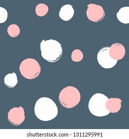 Irregular polka dot drawn by hand with rough brush. Simple watercolor seamless pattern. Grunge, sketch, paint. Blue, white, pink. Vector illustration.