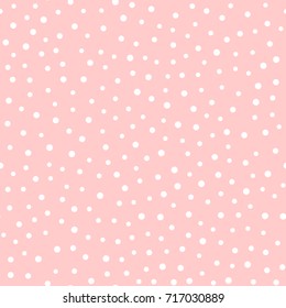 Irregular polka dots. Trendy seamless pattern. White circles on pink background. Vector illustration.
