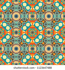 Islam, Arabic, Indian, ottoman motifs. Perfect for printing on fabric or paper. Vintage vector decorative elements in orange, beige and blue tones. Seamless pattern tile.
