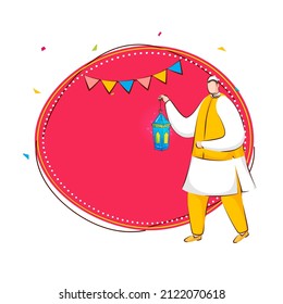 Islamic Festival Celebration Concept With Faceless Islamic Man Holding Lantern And Copy Space On Pink And White Background.
