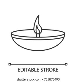 Islamic oil lamp linear icon. Diya. Thin line illustration. Islamic culture. Burning bowl oil lamp. Contour symbol. Vector isolated outline drawing. Editable stroke