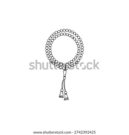 Islamic prayer beads (tasbih) with tassels, representing devotion and spiritual practice.
