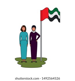 islamic women with traditional burka and arabia flag in pole