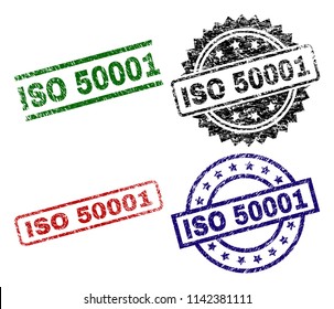 ISO 50001 seal prints with corroded texture. Black, green,red,blue vector rubber prints of ISO 50001 label with retro texture. Rubber seals with circle, rectangle, medallion shapes.