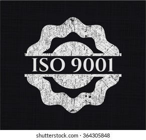 ISO 9001 written on a blackboard