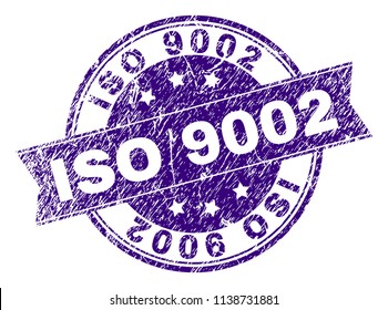 ISO 9002 stamp seal imprint with distress texture. Designed with ribbon and circles. Violet vector rubber print of ISO 9002 label with dust texture.