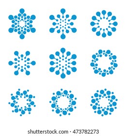 Isolated abstract blue color dotted snowflakes pattern. Round winter elements logo set. Cold season logotype collection. New year greeting card symbols. Virus signs. Flower icons.Vector illustration.