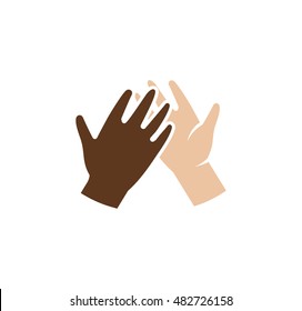 Isolated abstract dark and light skin human hands together logo. Giving high five black and white people hands logotype. International friendship sign. Equal rights symbol. Vector illustration.
