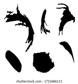 Isolated black brush strokes made by hand 