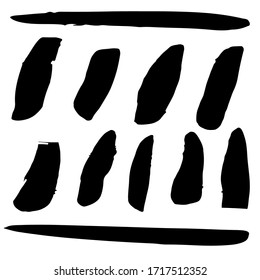 Isolated black brush strokes made by hand