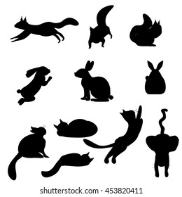 Isolated black silhouettes cat, rabbit, squirrel