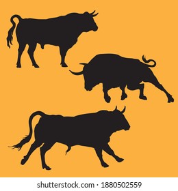 isolated black silhouettes of three different Bulls \ standing, running, attacking\, a set of isolated silhouettes for design and decor