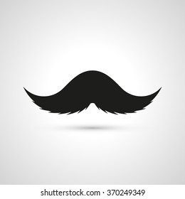 Isolated black vector mustache logo. Designed barber's emblem. Hairdresser's label. Masculinity. Masculine attribute. Retro symbol. Barbershop icon. Shaving sign. Facial element.