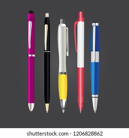 Isolated  blue, yellow, black, pink and blak metal pen set on green background for education, school, publishing and web design