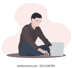 Isolated brunette man sitting cross-legged in front of a laptop on the floor and looking at the screen