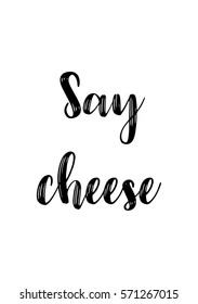 Isolated calligraphy on white background. Quote about photo and photography. Say cheese.